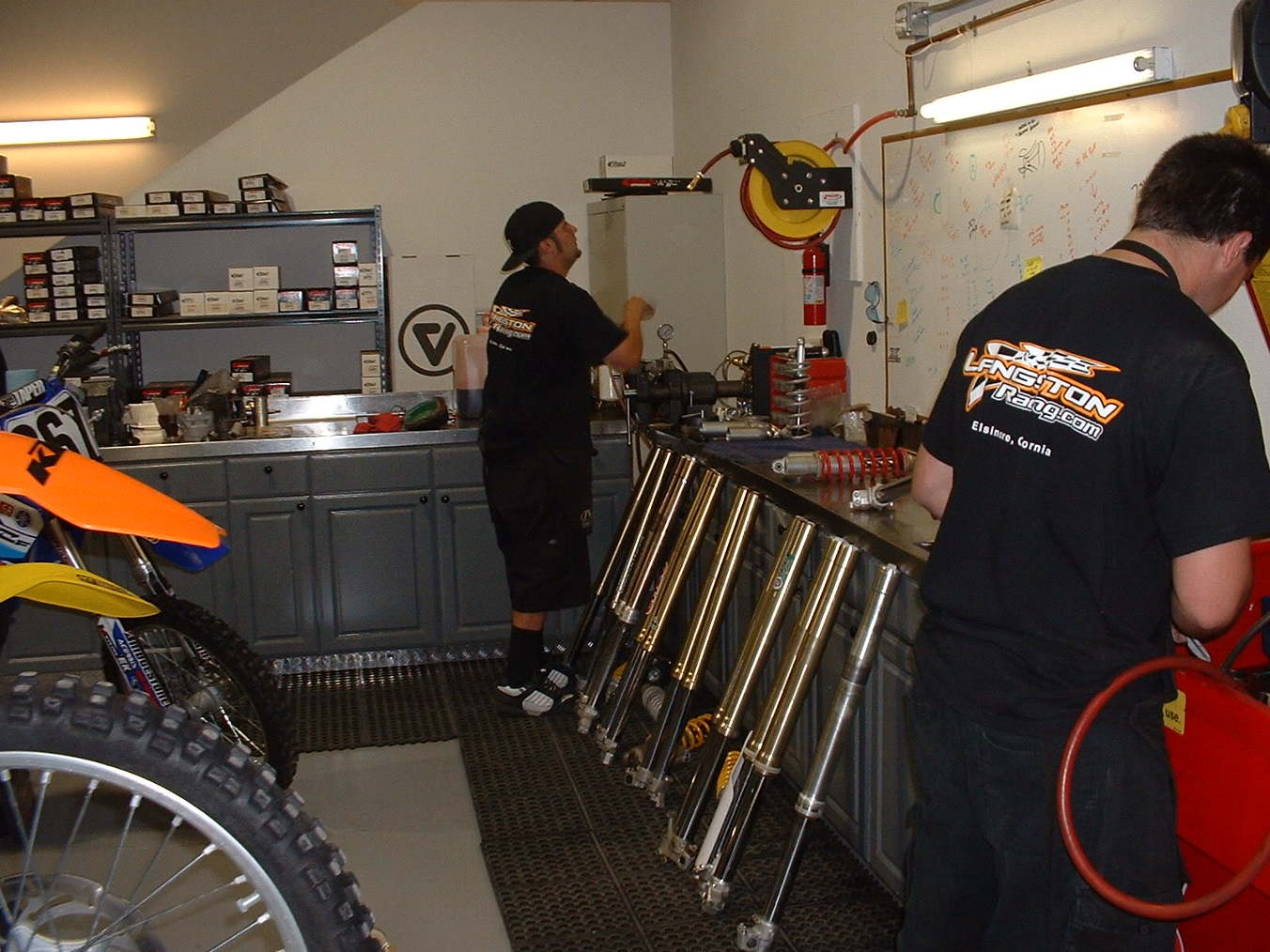 Repair technicians working at Langston Motorsports.