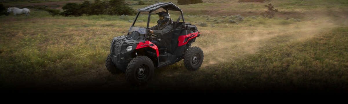 One person Riding a Red UTV, Off-Road riding Banner. 