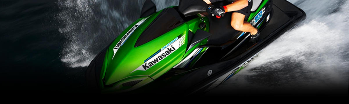 One Person riding a Green Kawasaki Personal watercraft 